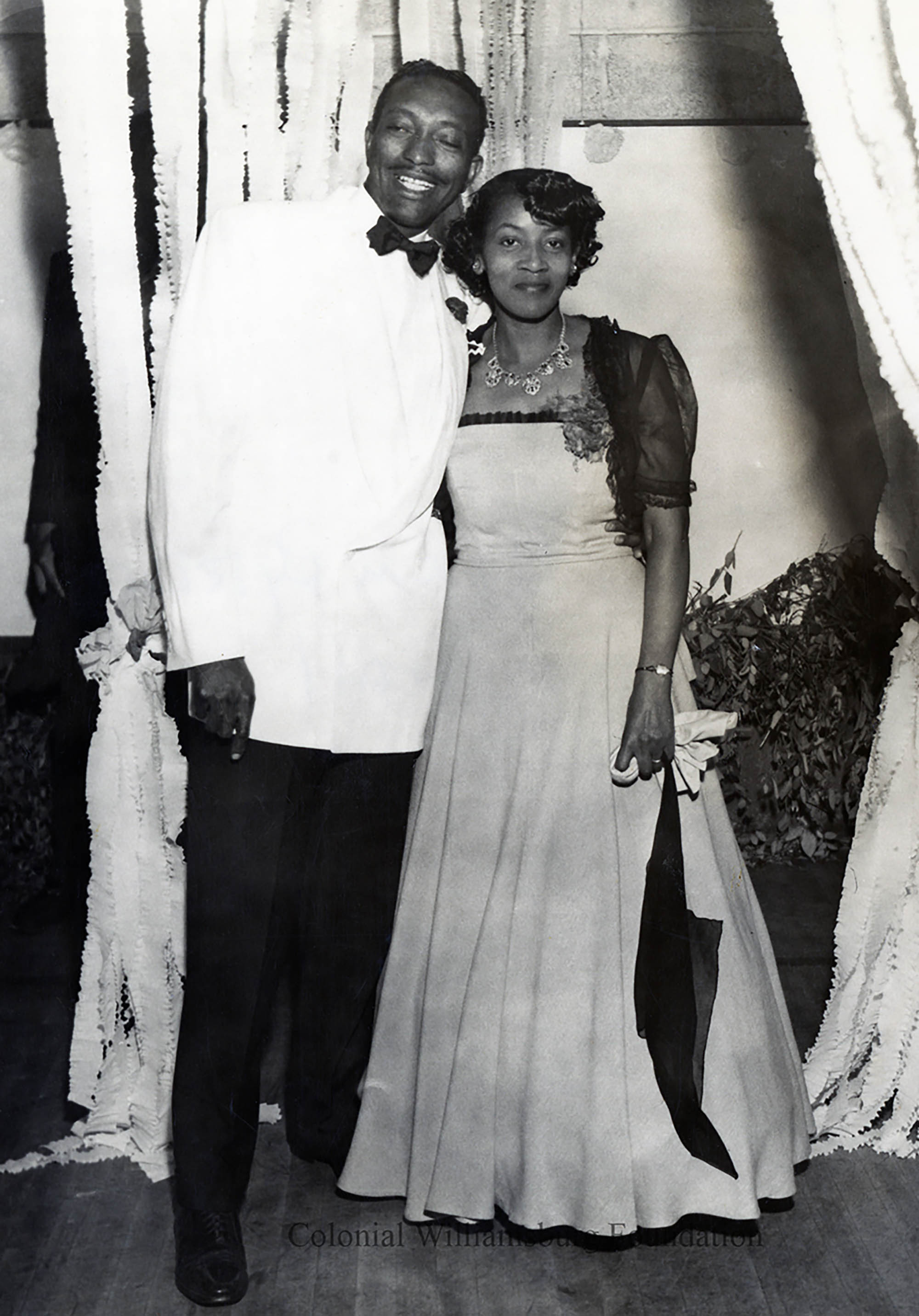 African American Couple At Dance Possibly In The Williamsburg VA Area Transcribe