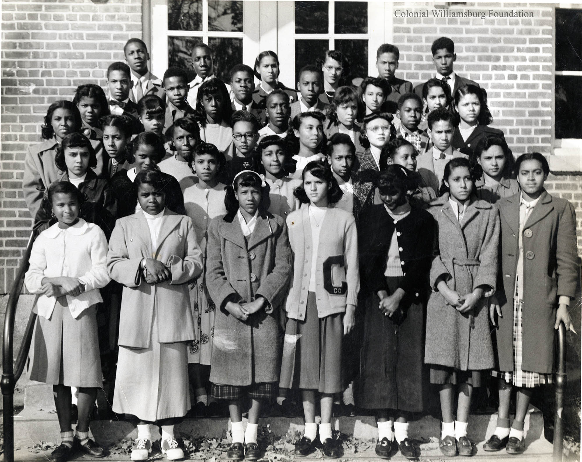 Group Of Students Posing On Steps Of A School Possibly In The Williamsburg VA Area Transcribe