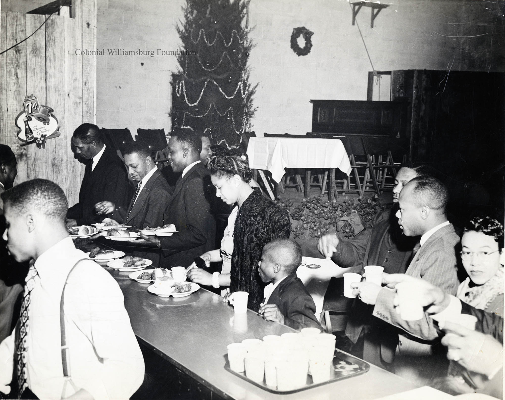 African Americans Gathered For A Christmas Party Possibly In The Williamsburg VA Area Transcribe